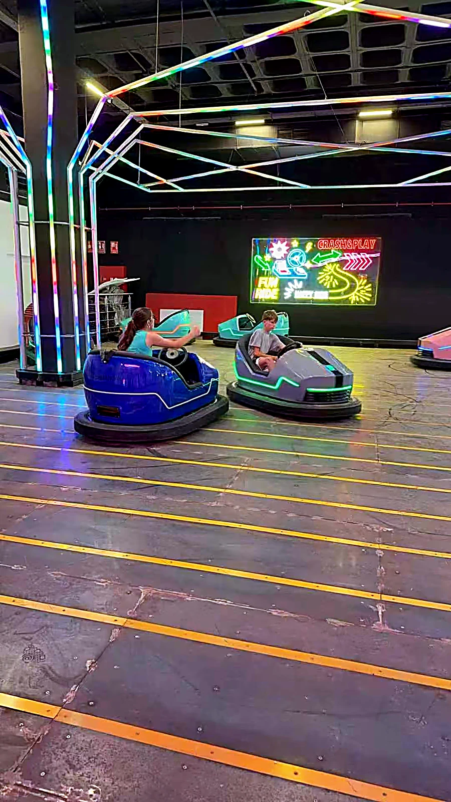 Riders on bumper cars at a Spanish FEC